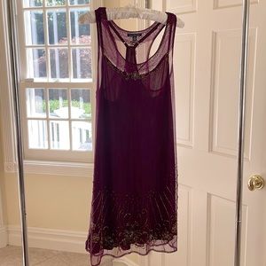 Like new plum, bugle beaded American Eagle racer back dress with slip.